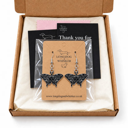 Black Skullwing Moth Drop Earrings in gift-ready packaging