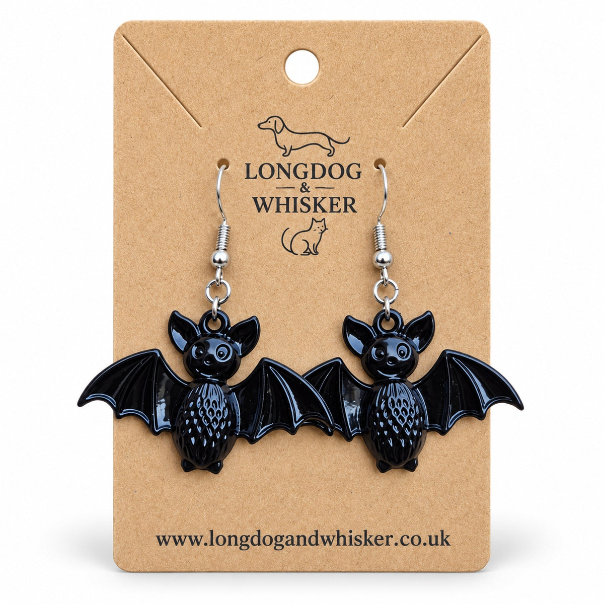 Black smiley bat earrings on a Longdog & Whisker kraft display card