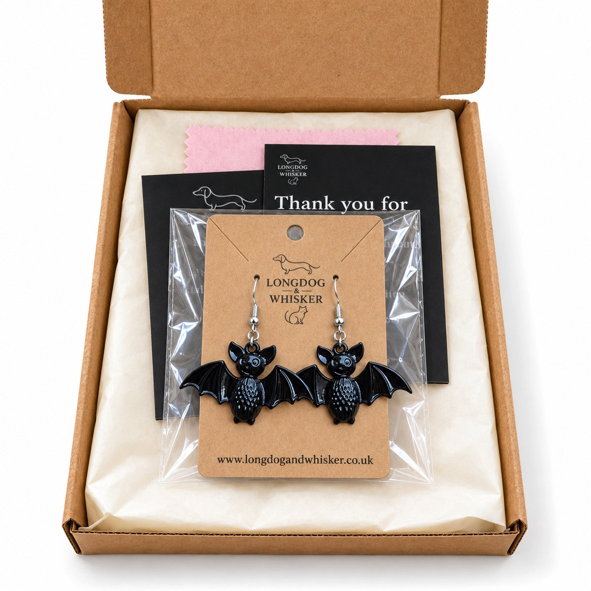 Black smiley bat earrings in Longdog & Whisker gift-ready packaging
