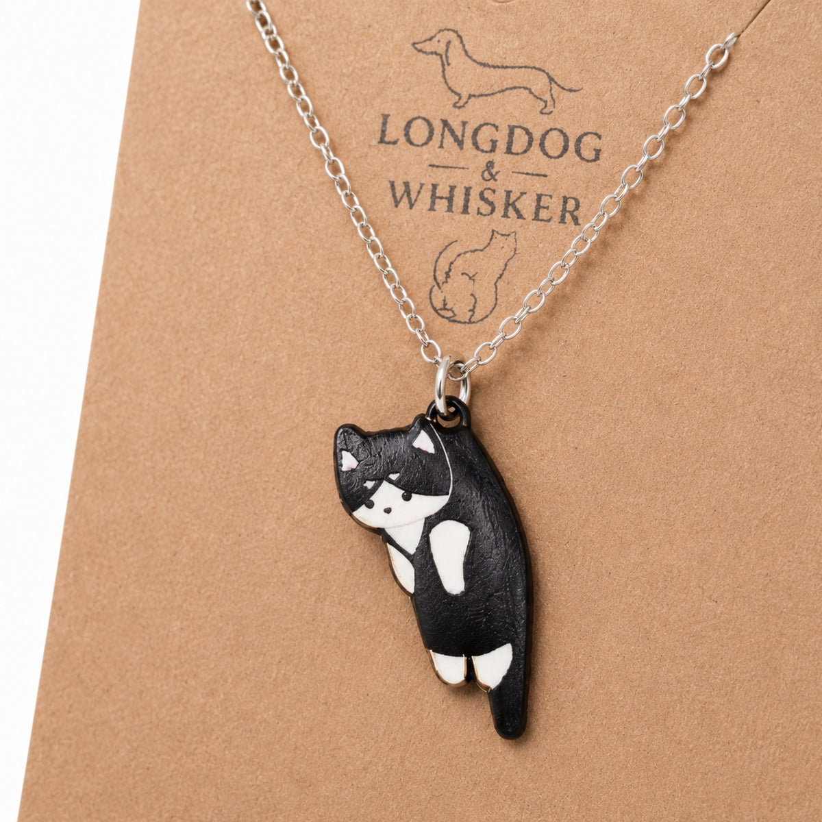 Close-up detail of Scruffles Cat Necklace - Black & White
