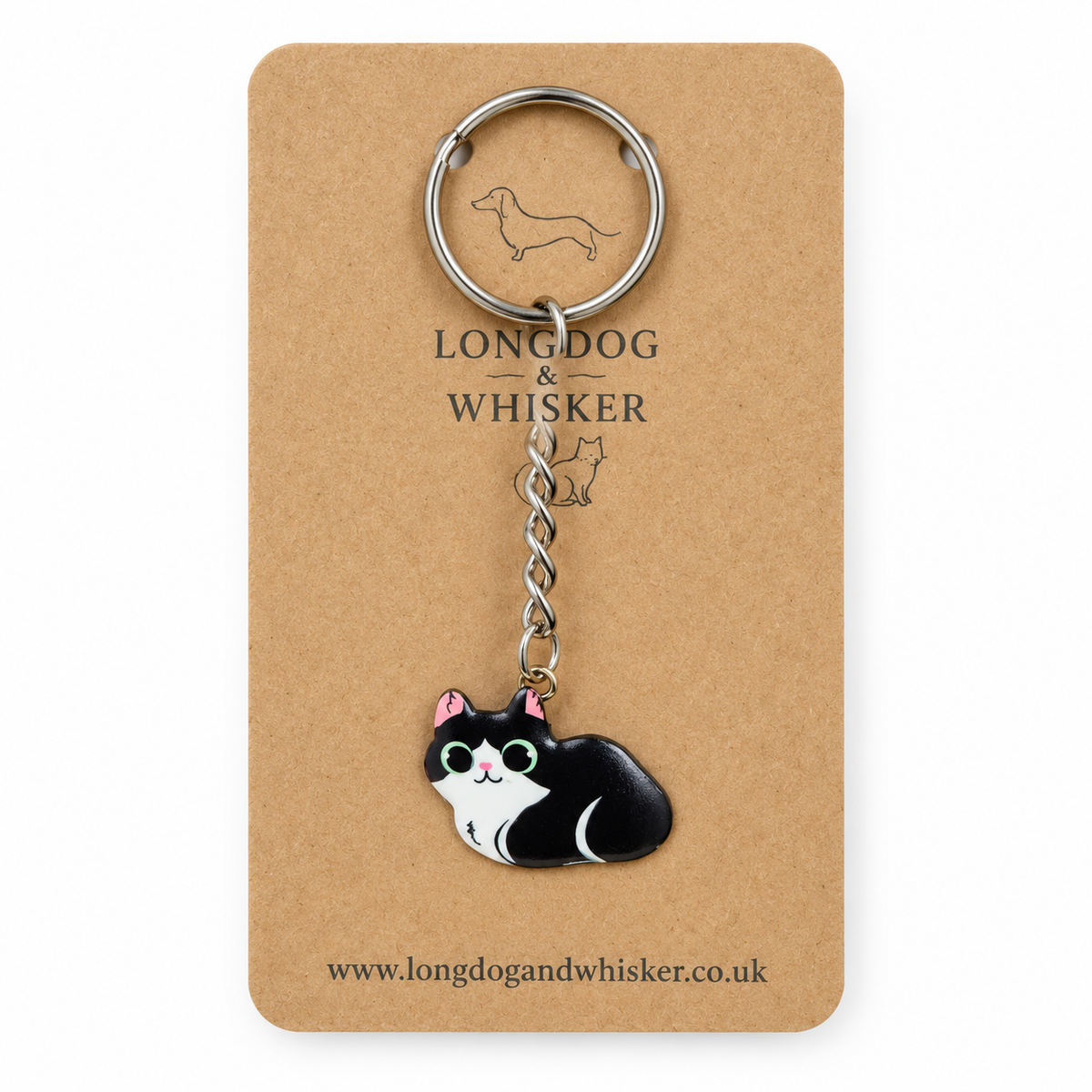 Close-up of black and white cat keyring and silver-tone hardware