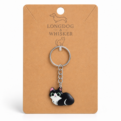 Black and white cat keyring on Longdog & Whisker display card