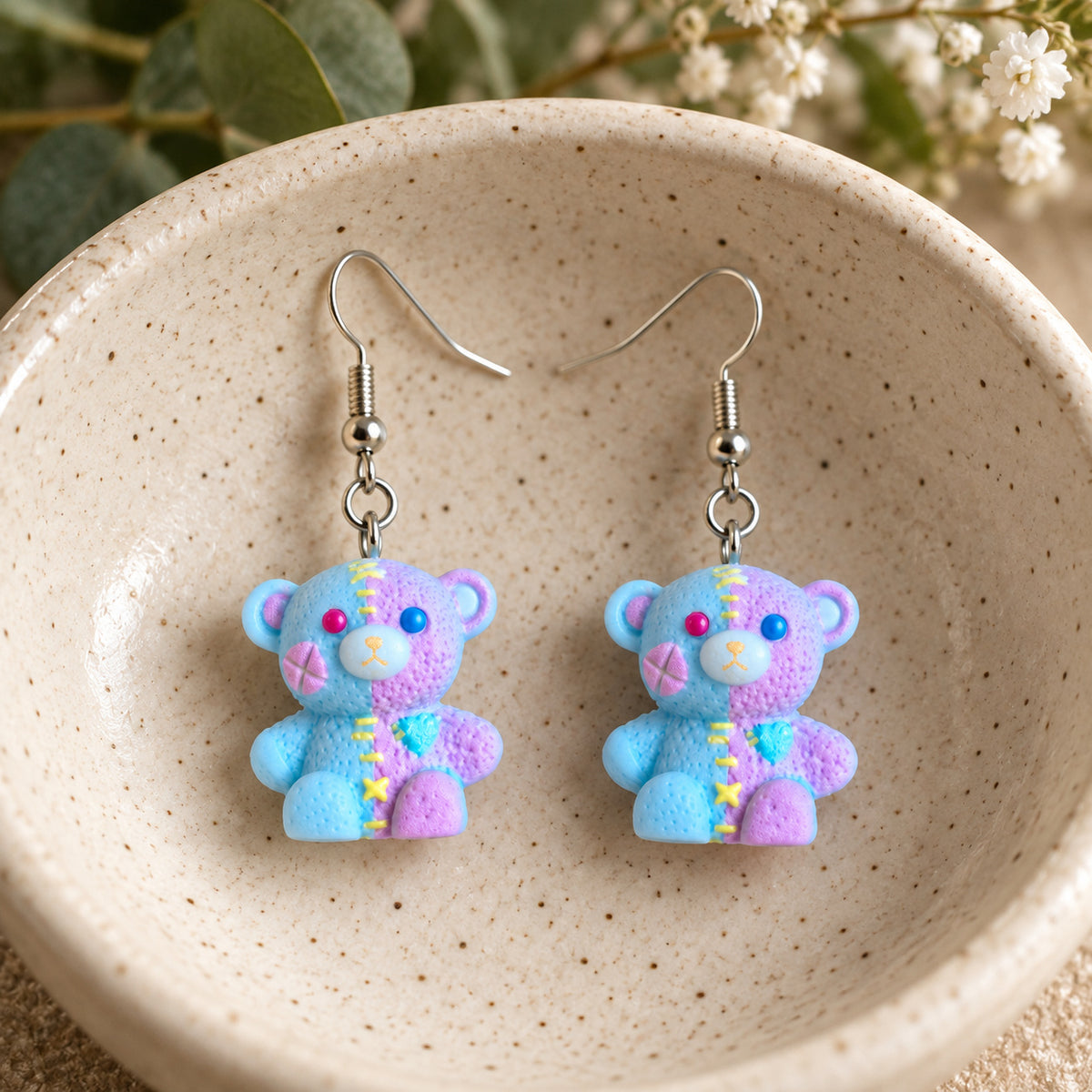 Blue Pastel Stitched Zombie Bear Earrings in ceramic bowl lifestyle scene