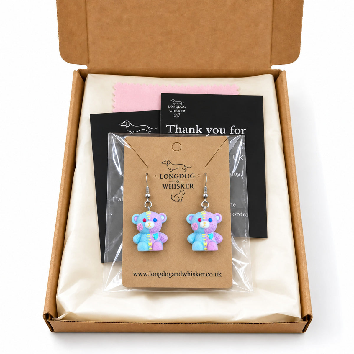 Blue Pastel Stitched Zombie Bear Earrings packaged in Longdog & Whisker gift box