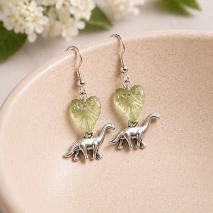 Brontosaurus Earrings displayed in a lifestyle product photo