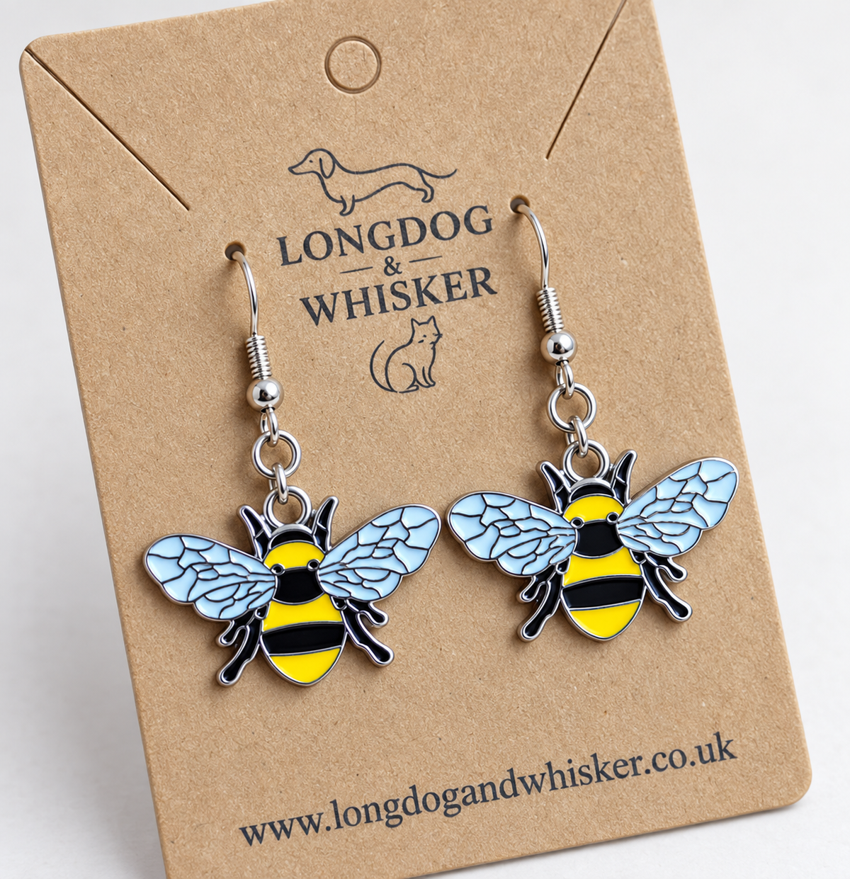 Close detail of Bumble Bee Earrings and silver-tone hooks