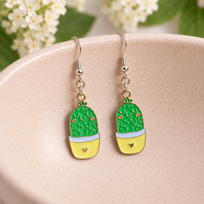 Cacti Heart Earrings with silver-tone hooks on a blush speckled bowl