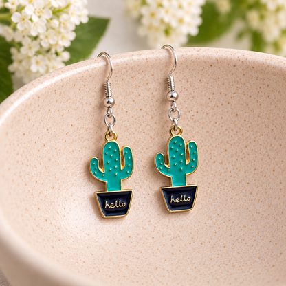 Cacti Hello Earrings with silver-tone hooks on a blush speckled bowl