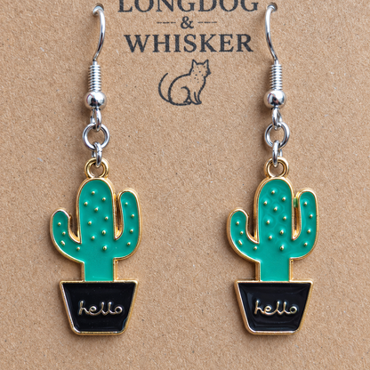 Close-up of Cacti Hello Earrings with silver-tone hooks and gold-tone charm trim