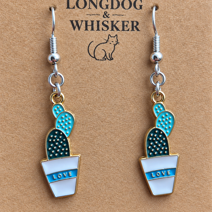 Close-up of Cacti Love Earrings with silver-tone hooks and gold-tone charm trim