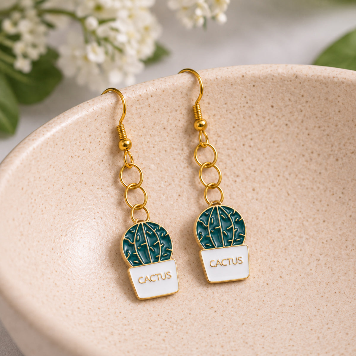 Cacti 'Cactus' Earrings displayed in a lifestyle product photo