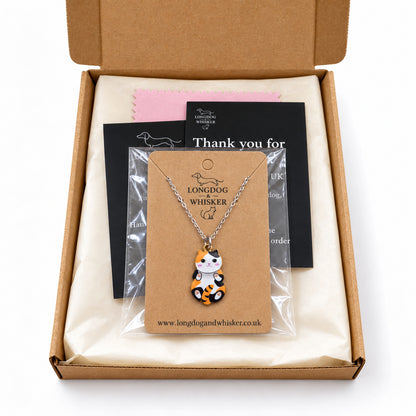 Calico Belly Rub Cat Necklace in gift-ready Longdog & Whisker packaging