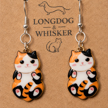 Close-up detail of Belly Rub Cat Earrings - Calico