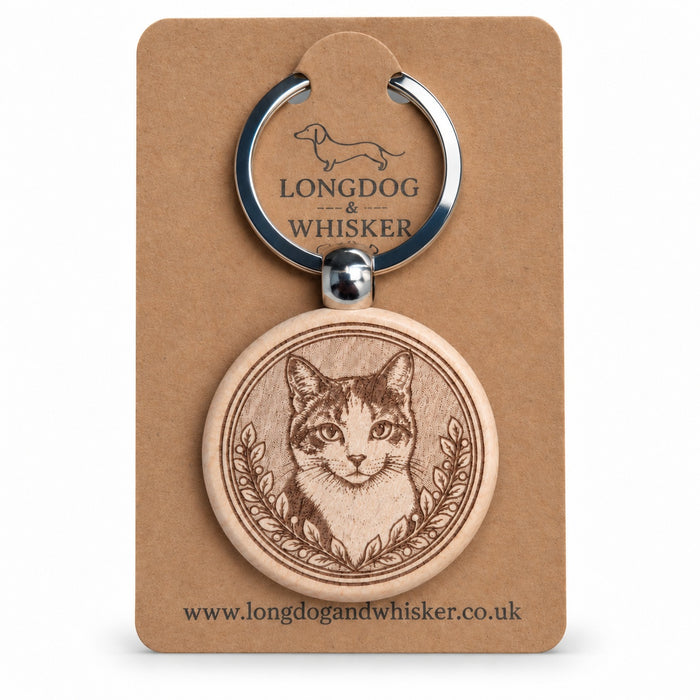 Calico cat wooden keyring with leafy portrait border on a Longdog & Whisker kraft card