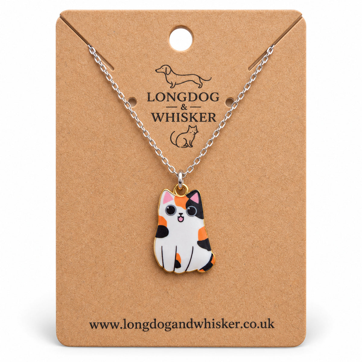 Calico chonky cat necklace on a silver chain, displayed on a Longdog & Whisker kraft card