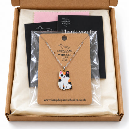 Calico chonky cat necklace on its card in Longdog & Whisker gift-ready packaging