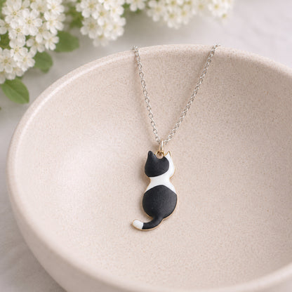 Cat Patches Necklace displayed in a lifestyle product photo