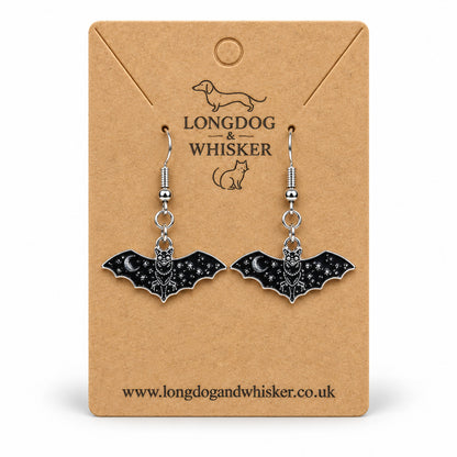 Celestial moon bat drop earrings on a Longdog & Whisker card