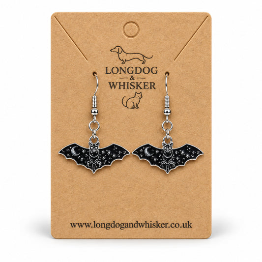 Celestial moon bat drop earrings on a Longdog & Whisker card