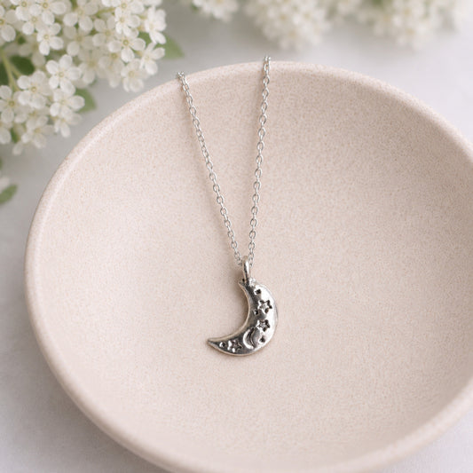Celestial Moon Necklace in bowl lifestyle photo