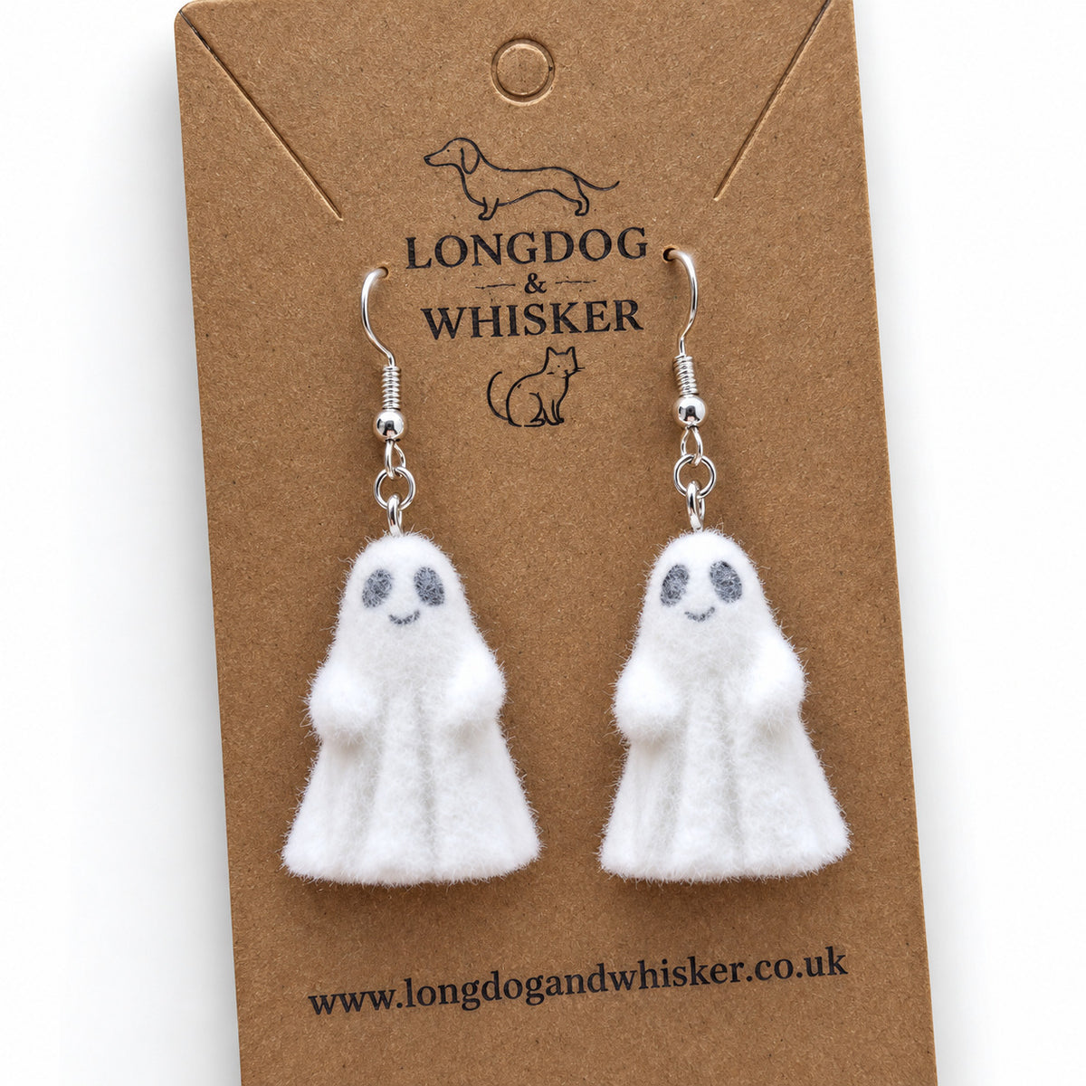 Close-up of Cheeky Ghost Earrings showing their fluffy felt texture and silver-tone hooks