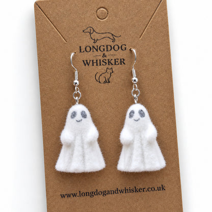 Close-up of Cheeky Ghost Earrings showing their fluffy felt texture and silver-tone hooks