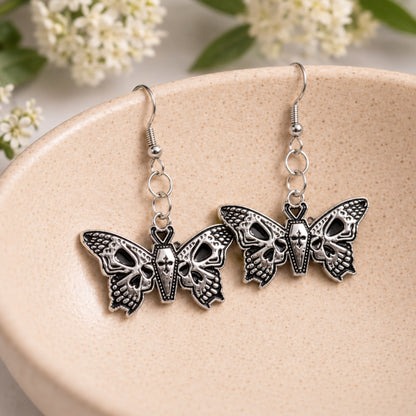 Coffin Butterfly Earrings displayed in a lifestyle product photo