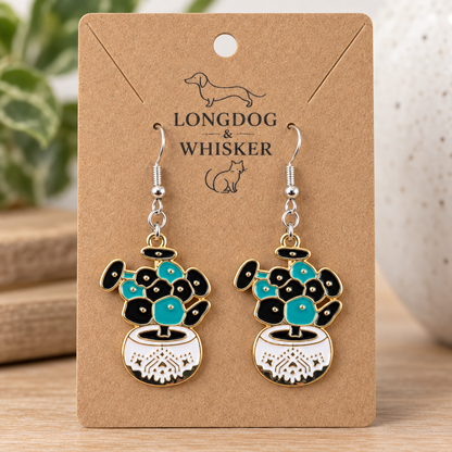 Close-up of Coin Leaf Plant Pot Earrings with silver hooks