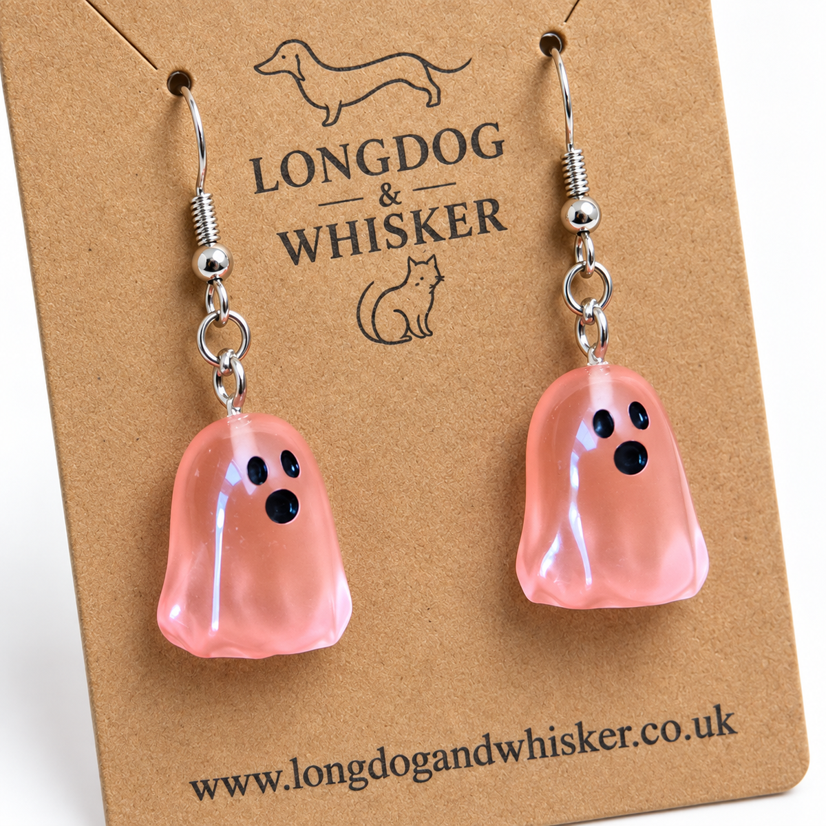 Close-up of the coral Ghost Earrings
