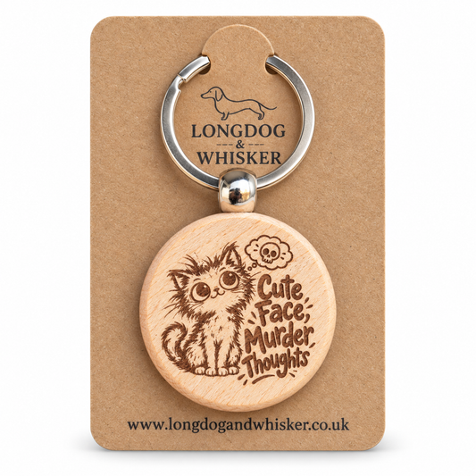 Cute Face Murder Thoughts cat wooden keyring on a Longdog & Whisker card