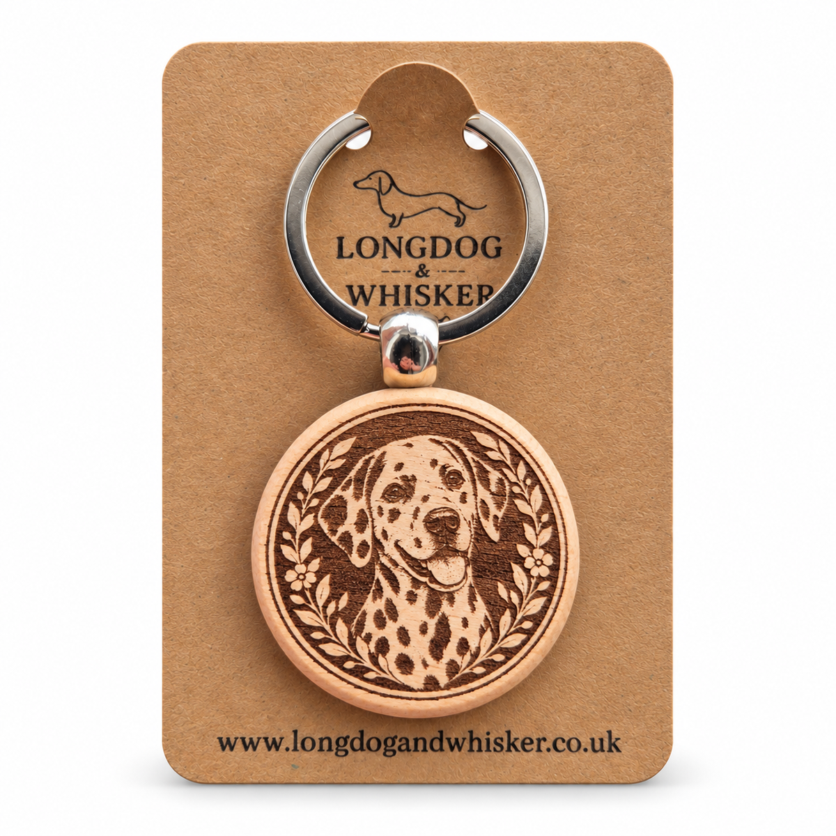 Dalmatian wooden keyring on a Longdog & Whisker product card