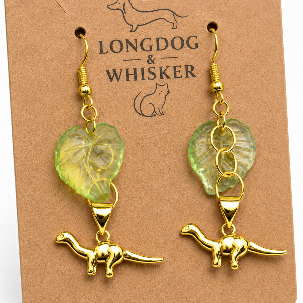 Close-up detail of Small Dippy Dinosaur Earrings - Gold Hook
