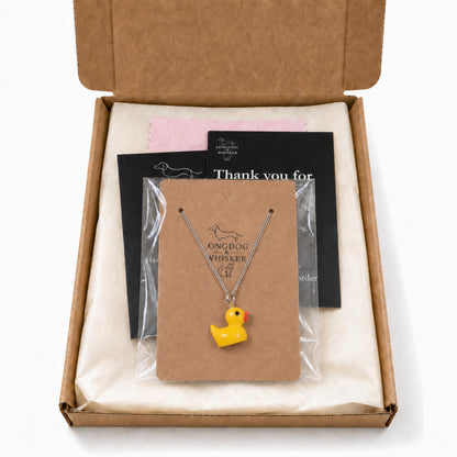 Rubber Duck Necklace with silver chain in Longdog & Whisker packaging