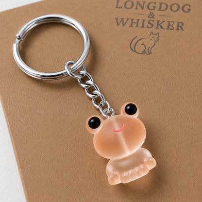 Close-up detail of the Frosted Frog in Apricot Keyring & Bag Charm