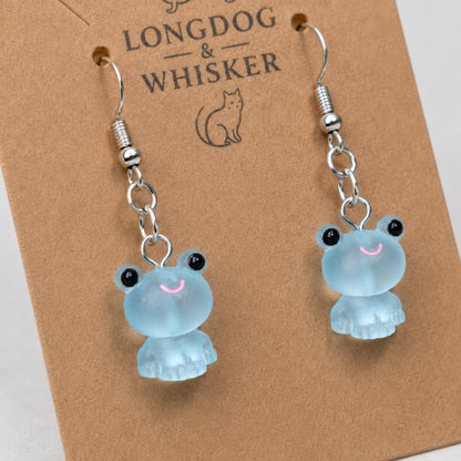 Close-up detail of Frosted Frog in Aqua Earrings