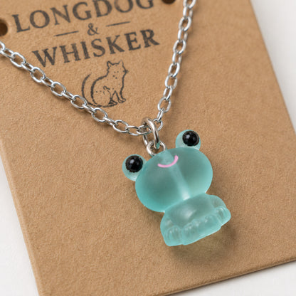 Close-up detail of Frosted Frog in Aqua Necklace
