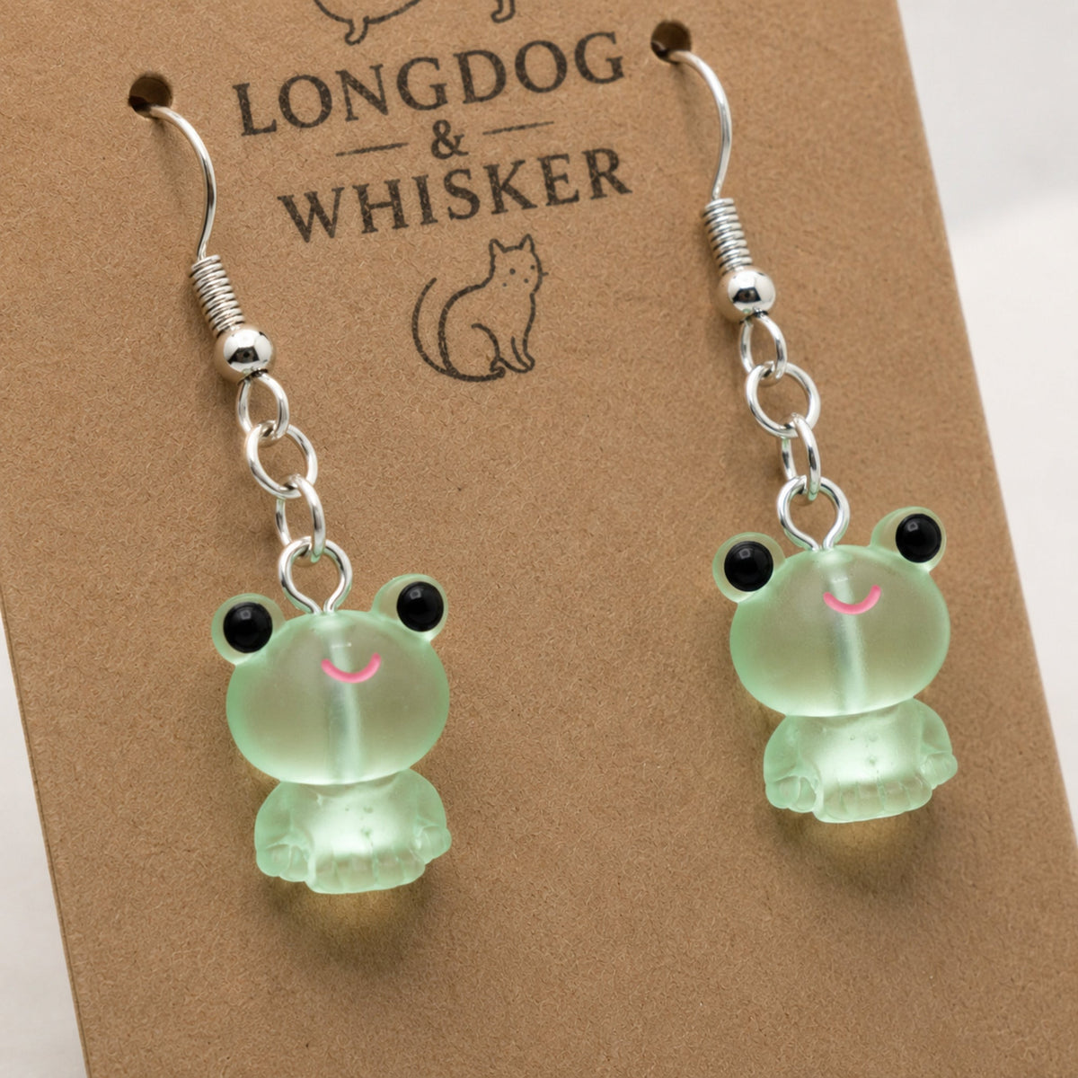 Close-up detail of Frosted Frog in Green Earrings