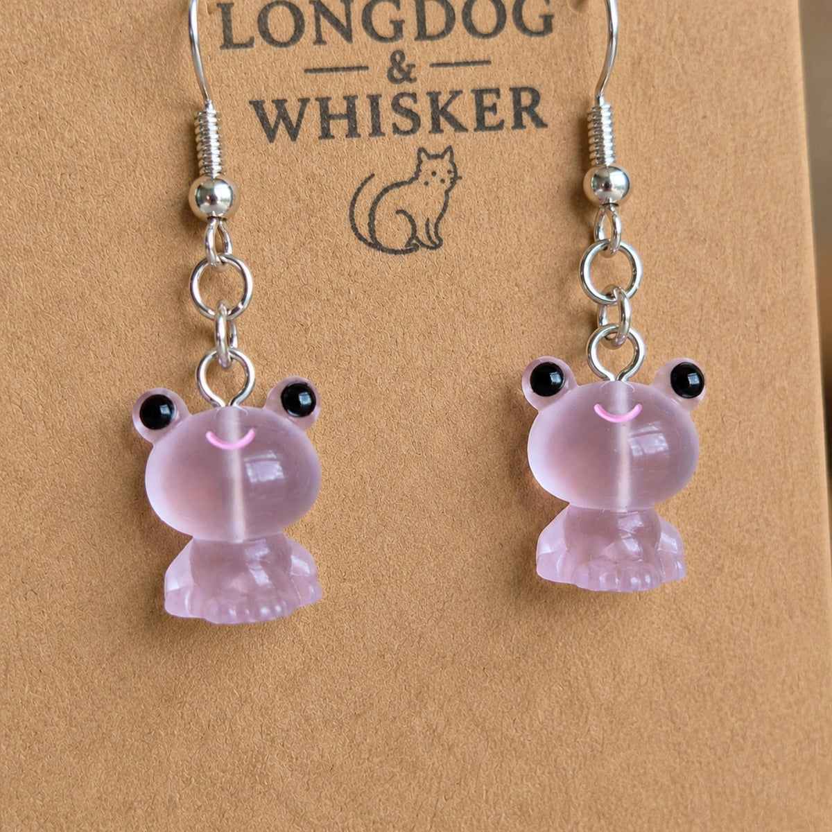 Close-up detail of Frosted Frog in Lilac Earrings