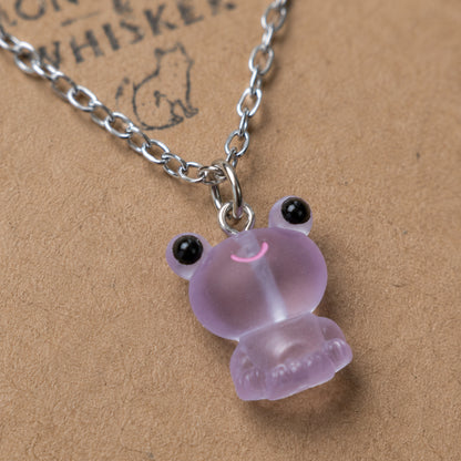 Close-up detail of Frosted Frog in Lilac Necklace