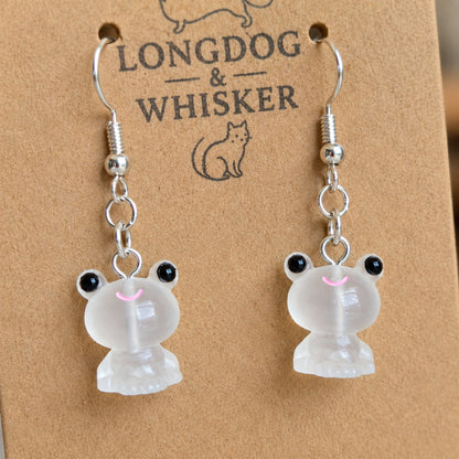Close-up detail of Frosted Frog in White Earrings