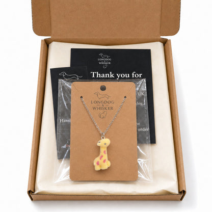 Fuzzy Giraffe Necklace in Longdog & Whisker gift-ready packaging