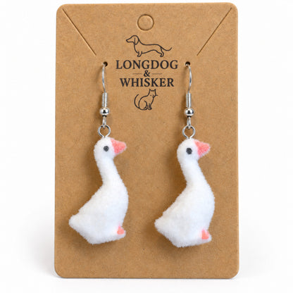 Close-up of Fuzzy Goose Earrings with silver-tone hooks