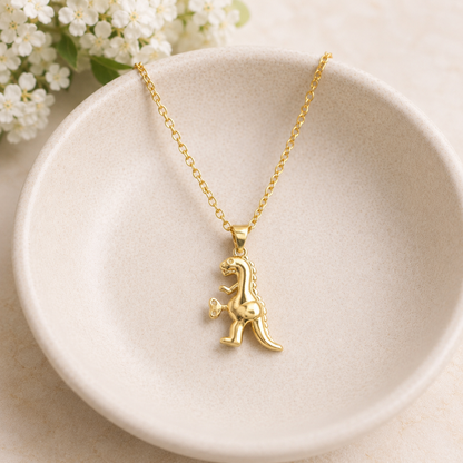 Clockwork Dinosaur Necklace displayed in a lifestyle product photo