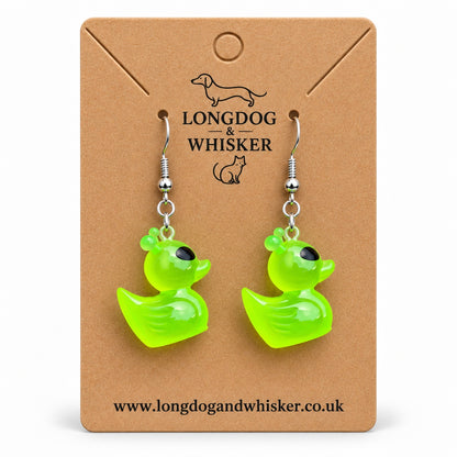Translucent Green Alien Duck Earrings on a Longdog & Whisker kraft display card