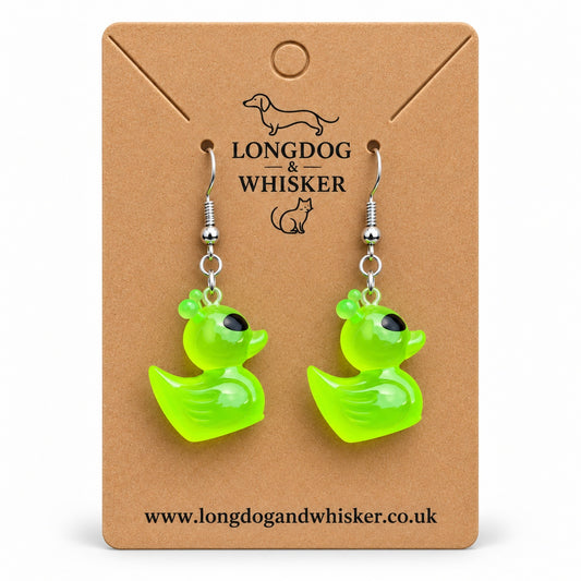 Translucent Green Alien Duck Earrings on a Longdog & Whisker kraft display card