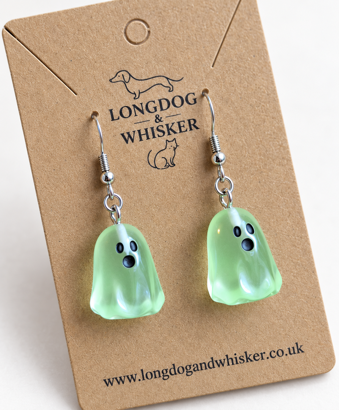 Close detail of Green Ghost Earrings and silver-tone hooks