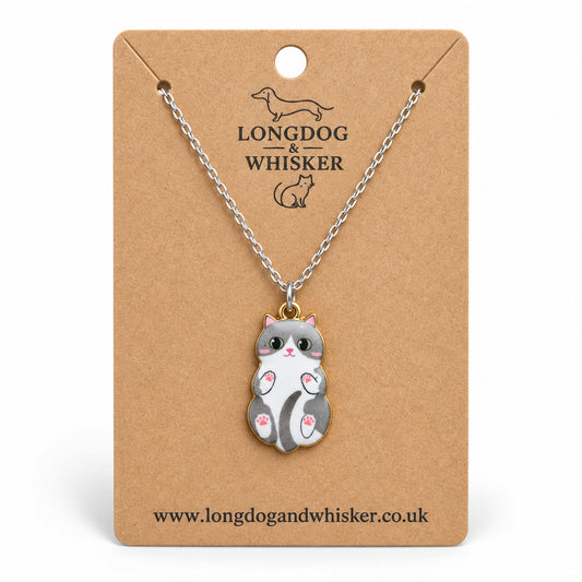 Grey Belly Rub Cat Necklace on a silver-tone chain displayed on a Longdog & Whisker kraft card