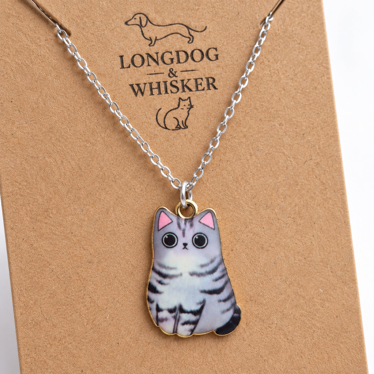 Close-up of the grey tabby cat pendant, striped markings and mixed-tone fittings