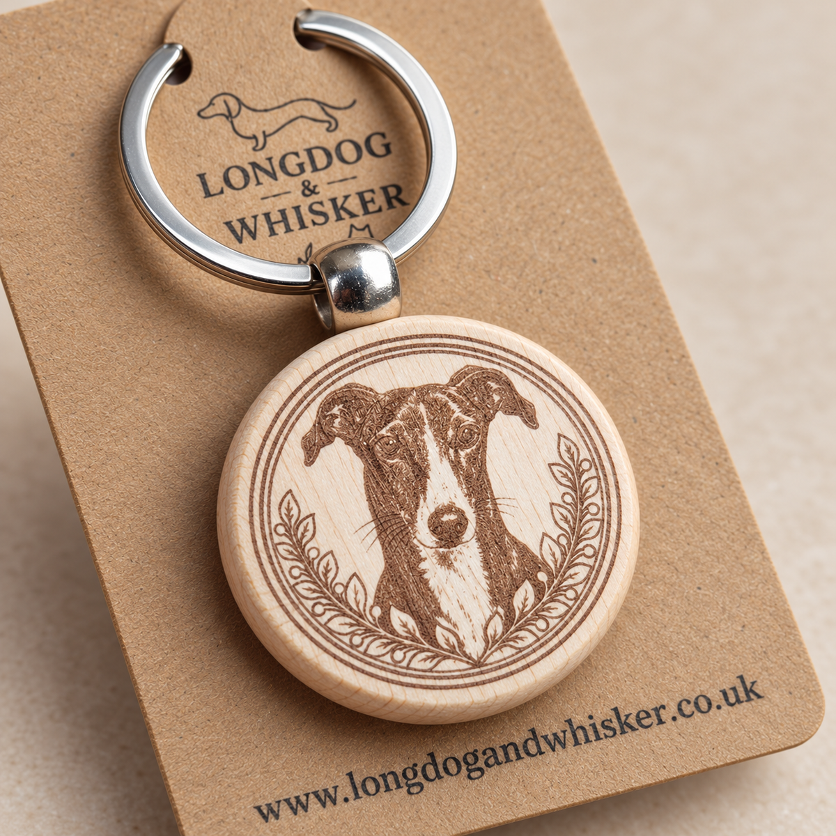 Close-up of Greyhound portrait, leafy border, natural wood edge and silver connector