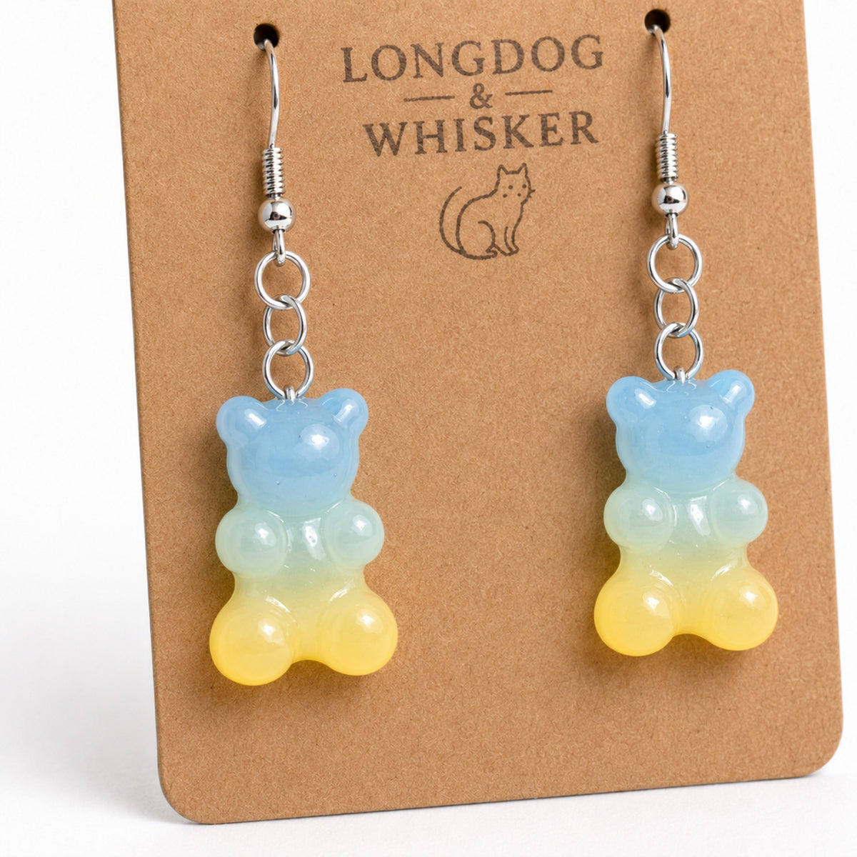 Close-up detail of Gummy Bear Earrings - Pale Blue / Yellow